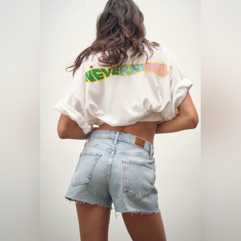 BDG Girlfriend High-Waisted “Tinted Denim” Blue Raw Hem Denim Shorts